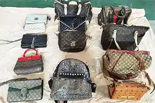 collection of used designer bags that Hissenglobal has in stock