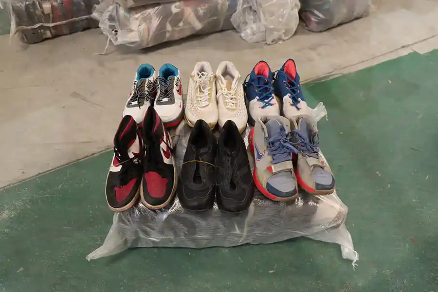 six pairs of used men's sports shoes