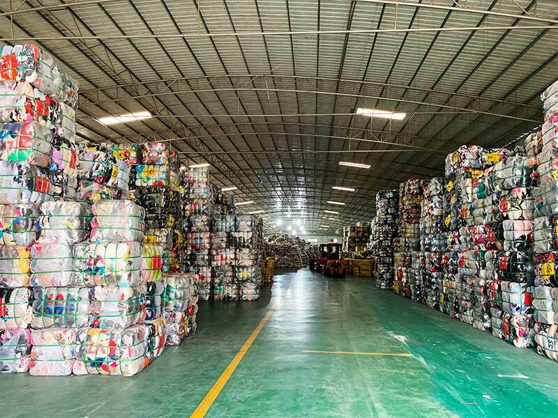 HissenGlobal's sorting warehouse filled with bales of used clothing 2