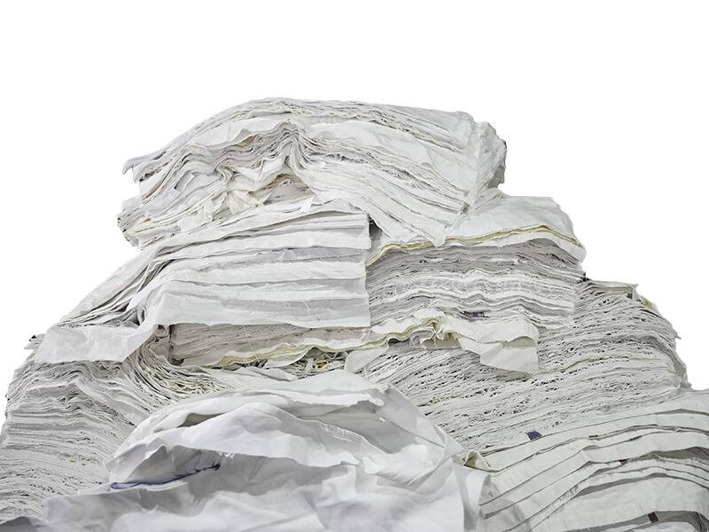 large pile of used white rags