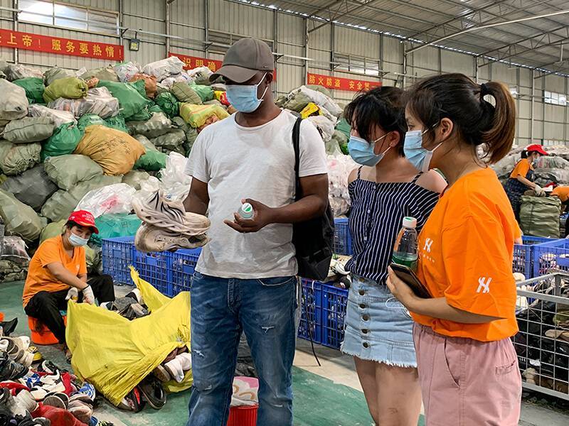 HissenGlobal staff showing a customer our sorting facility