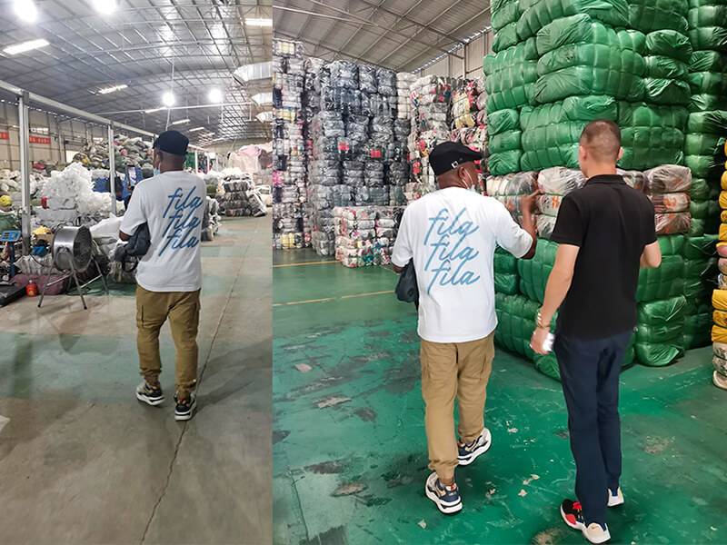 customer witnessing firsthand how HissenGlobal sorts its used clothing