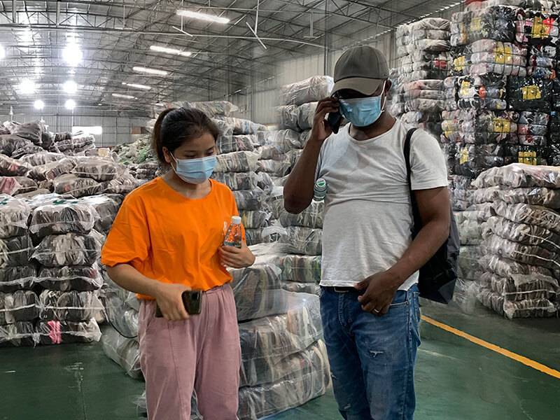 customer and staff in the middle of a factory tour