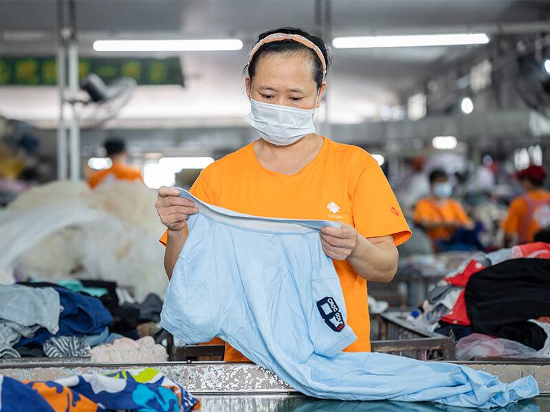 sorters inspect each used clothing using established industry standards